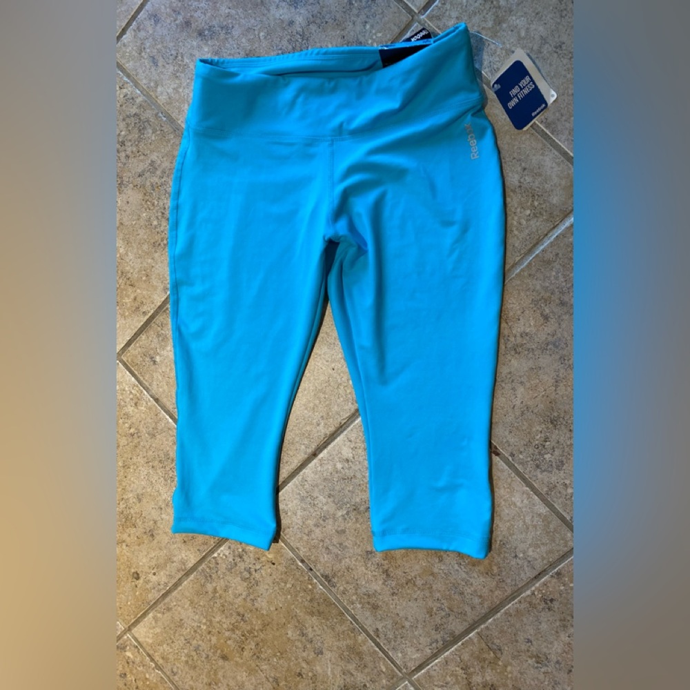 NWT Reebok - Woman’s teal Capri leggings (play dry wick moisture), Size: M